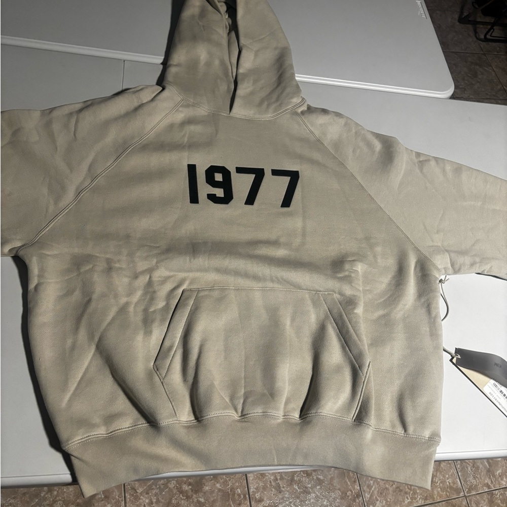 1977 men’s essential hoodie color wheat 
New never worn with tags